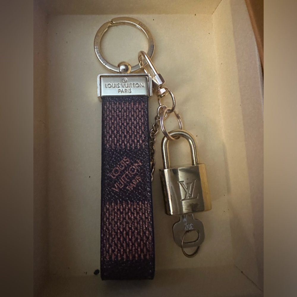 Louis Vuitton Gold Tone Padlock and Corresponding Key.